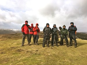 Standing firm in the strong winds on Crug Mawr
