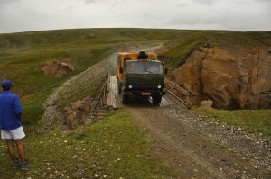 Sasha brings the lorry across the fragile bridge