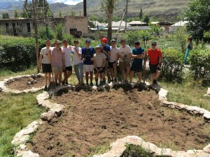 The tidied garden and team