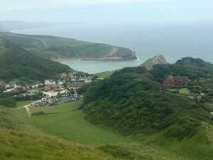 Looking back at Lulworth Cove beyond the car park