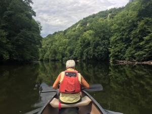 Claire fiddling with her camera and certainly not paddling!
